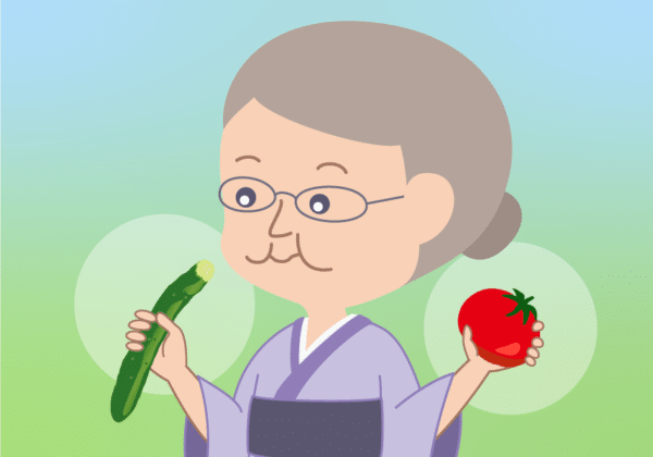 トマトときゅうりを持ってるおばあちゃん